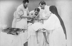 Binding the Arteries of a Hindoo Twin After Surgery