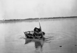Mandan Indian Rowing a Bull Boat