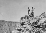 3 Crow Indians on Cliff