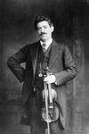 Fritz Kreisler Holding Violin