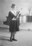 Rubinstein Holding a Violin