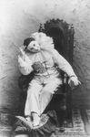 Pilar Morin as a Clown, Slouching in a Chair