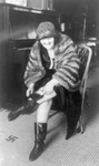 Woman Hiding a Flask in Her Boot During Prohibition