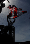 Picture of a Sailor Hoisting Flag