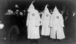 Three KKK Members in a Parade