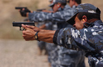 Iraqi Police Shooting Weapons