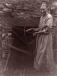 Woman by a Spinning Wheel