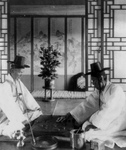 Men Playing Oriental Chess
