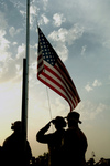 Soldiers Saluting the American Flag