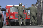 Soldiers Directing a Fire Truck