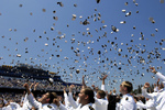 Sailors Throwing Hats at a Graduation Ceremony