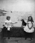 Children and Dog Near the Ocean