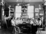 Female Students Reading in a Library