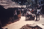 Person Issuing Ration Cards to African People in Port Harcourt, Nigeria During the Nigerian-Biafran War