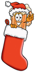 Clip art Graphic of a Frothy Mug of Beer or Soda Cartoon Character Wearing a Santa Hat Inside a Red Christmas Stocking