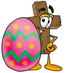 Clip Art Graphic of a Wooden Cross Cartoon Character Standing Beside an Easter Egg