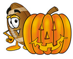 Clip Art Graphic of a Football Cartoon Character With a Carved Halloween Pumpkin
