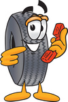 Clip Art Graphic of a Tire Character Holding a Telephone