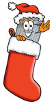 Clip Art Graphic of a Metal Trash Can Cartoon Character Wearing a Santa Hat Inside a Red Christmas Stocking