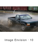 #10 Picture Of Young Man Off-Roading In A Pickup Truck