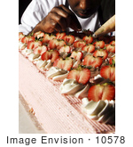 #10578 Picture Of A Man Frosting Cakes