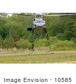 #10585 Picture Of Soldiers Hanging On Ropes Under A Helicopter