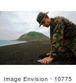 #10775 Picture Of A Soldier Collecting Sand From Iwo Jima