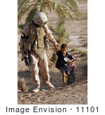 #11101 Picture Of A Soldier With An Iraqi Child