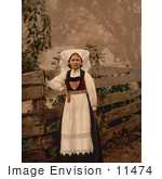 #11474 Picture Of A Norwegian Woman By A Fence