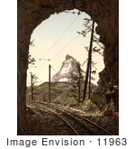 #11963 Picture Of Train Tracks In A Tunnel And Matterhorn Mountain