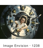 #1238 Photo Of A Riveter Woman Framed By A Circular Opening Of A Cowling Working On Lower Section