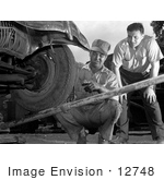 #12748 Picture Of A Man Adjusting Tires