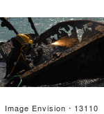 #13110 Picture Of A Navy Diver Cutting Parts Of A Shipwreck