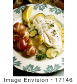 #17146 Picture Of A Fish Meal Served With Boiled Potatoes Steamed Zucchini And Squash And A Spring Of Parsley With A Lemon Slice