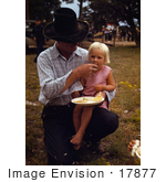 #17877 Photo Of A Cowboy Father Feeding His Daughter
