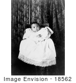 #18562 Photo Of African American Baby Wearing A Christening Gown Awaiting A Baptism