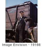 #19166 Photo Of A Male Welder Standing By A Railroad Car