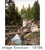 #19766 Photo Of A Man Standing On A Footbridge Above The Upper Waterfall Of The Great Kohlbach In The Tatra Mountains