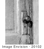 #20102 Stock Photo: Door Knob And Skeleton Keyhole On A Door