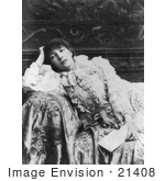 #21408 Stock Photography Of The Actress Sarah Bernhardt Holding A Letter And Leaning Against The Arm Of A Sofa