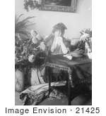 #21425 Stock Photography Of The Actress Sarah Bernhardt Holding A Hanky Sitting Behind A Table