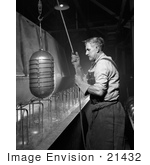 #21432 Historical Stock Photography Of A Male Worker Sterilizing Beverage Containers 1942