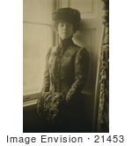 #21453 Stock Photography Of Alice Roosevelt Longworth Standing By A Window Resting Her Hands In A Muff