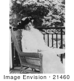 #21460 Stock Photography Of Alice Roosevelt Longworth Sitting In A Wicker Chair Outside