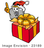 #23189 Clip Art Graphic Of A Flash Camera Cartoon Character Standing By A Christmas Present