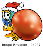 #24027 Clip Art Graphic Of A World Globe Cartoon Character Wearing A Santa Hat Standing With A Christmas Bauble