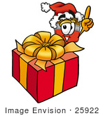 #25922 Clip Art Graphic Of A Red Paintbrush With Yellow Paint Cartoon Character Standing By A Christmas Present