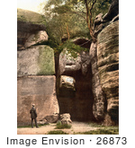#26873 Stock Photography Of A Man Reading The Carved Text On The High Rocks In Tunbridge Wells Kent England Uk