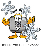 #28364 Clip Art Graphic Of A Flash Camera Cartoon Character Surrounded By Snowflakes In Winter
