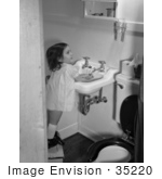 #35220 Stock Photo Of A Little Girl Standing On A Stool And Washing Her Hands After Using The Toilet